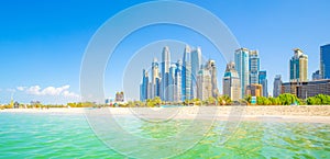 Marina beach and Dubai city skyline, UAE