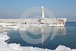 Marina into Black Sea, covered winter blanket of ice.