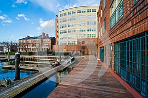 Marina and buildings along the waterfront in Fells Point, Baltimore, Maryland