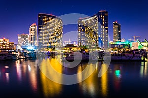 Marina and buildings reflecting at the Embarcadero at night in S