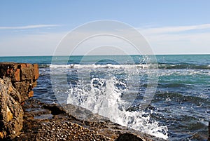 Marina. Olas y rocas photo