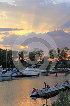 Marina Sunset with Yachts and Watercrafts photo