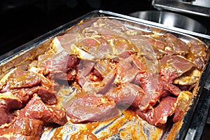 Marinaded meat prepared for barbecue