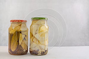 Marinades in a glass jar on a light background. Homemade marinades