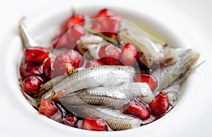Marinated anchovies with pomegranate