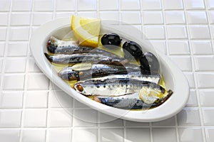 Marinated anchovies, spanish tapas food photo