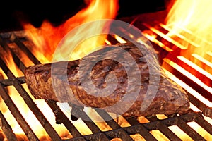 Marinated Beef Steak On The Flaming Hot BBQ Grill.