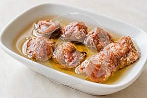 Marinated Canned Anchovy Fillet in Bowl / Anchovies served with Black Pepper on Marble Board