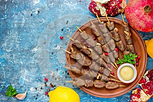 Marinated chicken hearts skewers