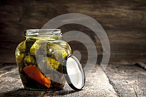 Marinated cucumbers in jar.