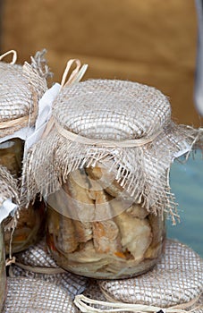 Marinated fish in glass jar