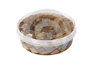 Marinated fish in a plastic container.