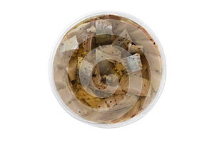 Marinated fish in a plastic container.