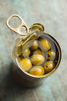 Marinated green olives in can