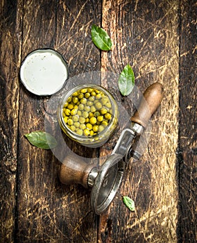 Marinated green peas with seamer.