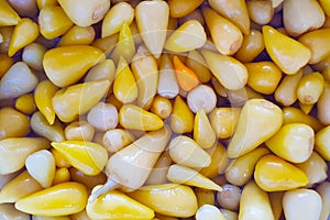 Marinated green pepperflies close-up background ingredients for salad