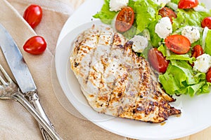 Marinated Grilled Healthy Chicken Breast served with Fresh Salad