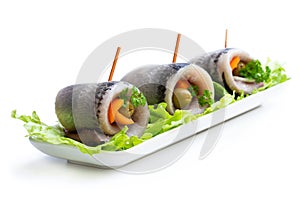 Marinated herring rolls with vegetable