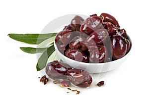 Marinated Kalamata Olives in Bowl over White