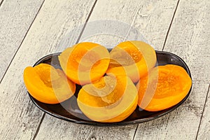 Marinated peaches fruit in the bowl