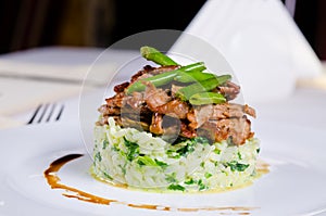 Marinated piquant sliced beef on savory rice