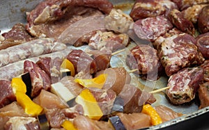 Marinated raw meat with vegetables for further frying on the barbecue, cooking meat, cooking