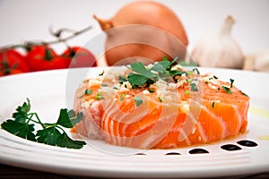 Marinated salmon fillet on plate