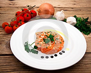 Marinated salmon fillet on plate