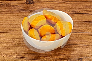 Marinated yellow patisson in the bowl