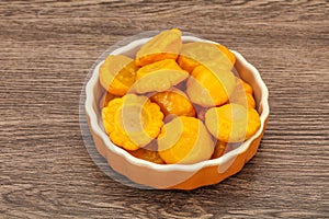 Marinated yellow patisson in the bowl