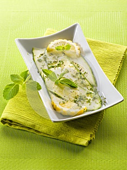 Marinated zucchinis with lemon photo