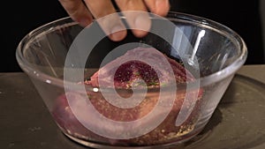 Marinating Beef Steak with spices and oil in bowl and refrigerate overnight.