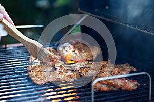 Marinating meat during grilling