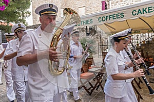 Marine brass band goes through the streets of Budva on holiday of St. Trinity