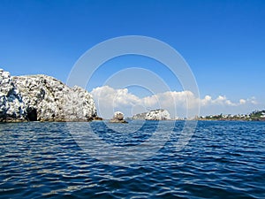 Marine cave in the middle of the sea in the Pacific Ocean. Mazatlan port, Sinaloa, Mexico photo