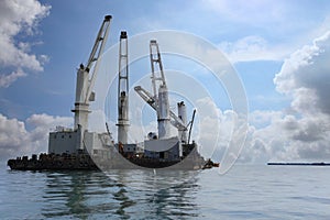 Marine cranes are used for loading and unloading cargo onto ships