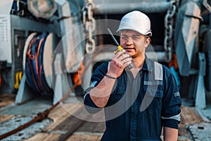 Marine Deck Officer or Chief mate on deck of offshore vessel or ship , wearing PPE personal protective equipment