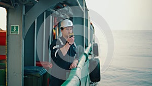 Marine deck officer or chief mate on deck of vessel or ship