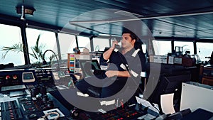 Marine Deck Officer or seaman on navigation bridge of vessel or ship