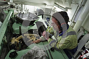 Marine Engineer maintaining a diesel engine