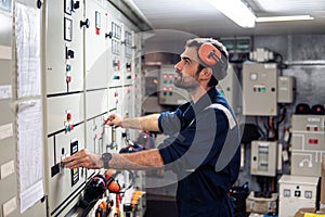 Marine engineer officer working in engine room