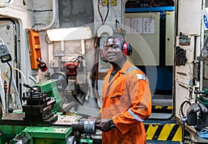 Marine engineer officer working in engine room