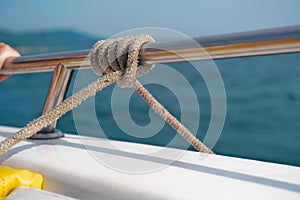 Marine knot detail on stainless steel boat railing banister