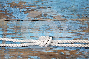 Marine knot on wooden background