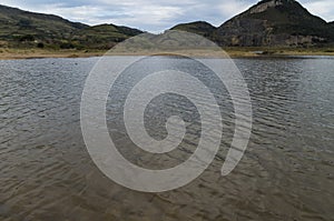 Marine lagoon with mountains in the background