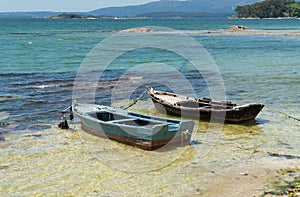 Marine landscape of Rias Baixas, Galicia with two small boats called Chalanas