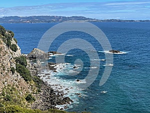 Marine Landscape. The view of rocky coastline at Tawharanui Regional Park in a sunny day, New Zealand