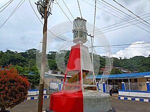 A marine lantern is a device attached to marking buoys, channels, bridges, barges, wharves and offshore structures so that ships photo
