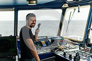 Marine navigational officer is reporting by VHF radio