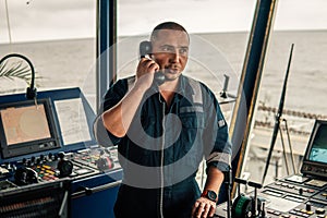 Marine navigational officer is reporting by VHF radio